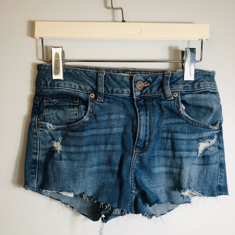 Garage Women's Medium Wash Distressed Denim Shorts